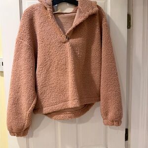 Pinkish cropped fleece hoodie with buttons on top